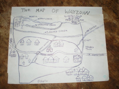Opens popup gallery with Mapping the land of the Wayzohn Clan's village, Rivercess County , Liberia.