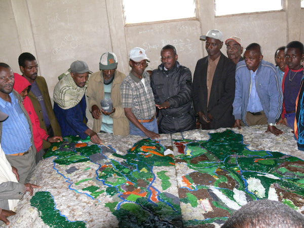 Community members make a 3-D map of their territory in theSsheka forest. © MELCA Ethiopia