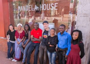 Faith (3rd from left) and her fellow learning exchange participants at Mandela House. 