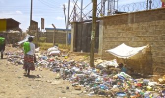 Opens popup gallery with A prone trader sells plastics and other items scavenged from Dandora, the largest dump in Africa.