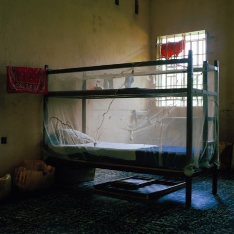 Opens popup gallery with A mosquito net covers an inmate‘s bed at the juvenile remand home in Freetown, Sierra Leone.
