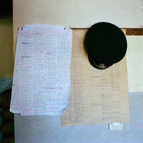 Opens popup gallery with A duty roster hangs on the wall at the divisional headquarters and central police station in Makeni, Sierra Leone.
