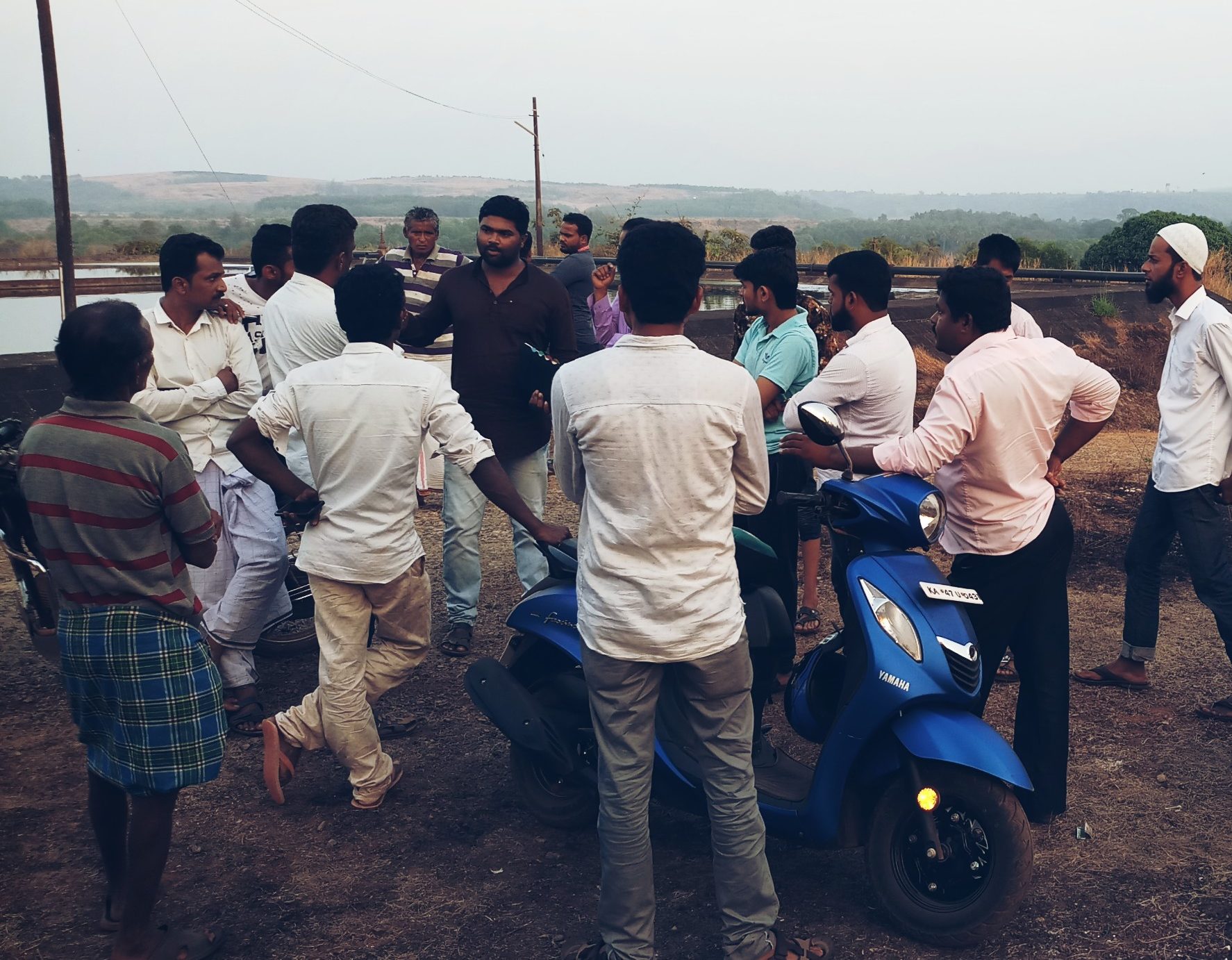 An enviro-legal coordinator discusses the Water Act with members of Hegale village, India.