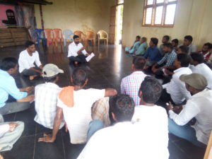 An enviro-legal coordinator holds a community legal training in Kasalagadde, India. 