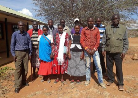 Opens popup gallery with Eleven of the fifteen members of Musul's Community Land Management Committee after a training on the Community Land Act in May 2019
Photo credit: IMPACT