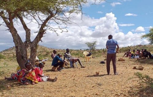 Opens popup gallery with Members of Musul community in Laikipia County break into small groups to discuss community bylaws. 
Photo credit: IMPACT